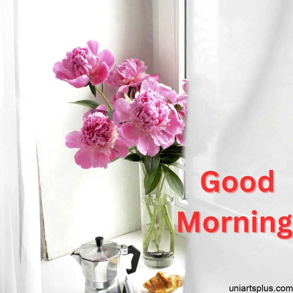 Image of Beautiful flowers in flowers pot with Good morning.